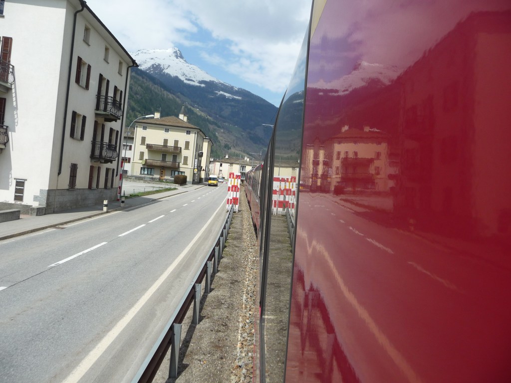 Train running through Poschiavo