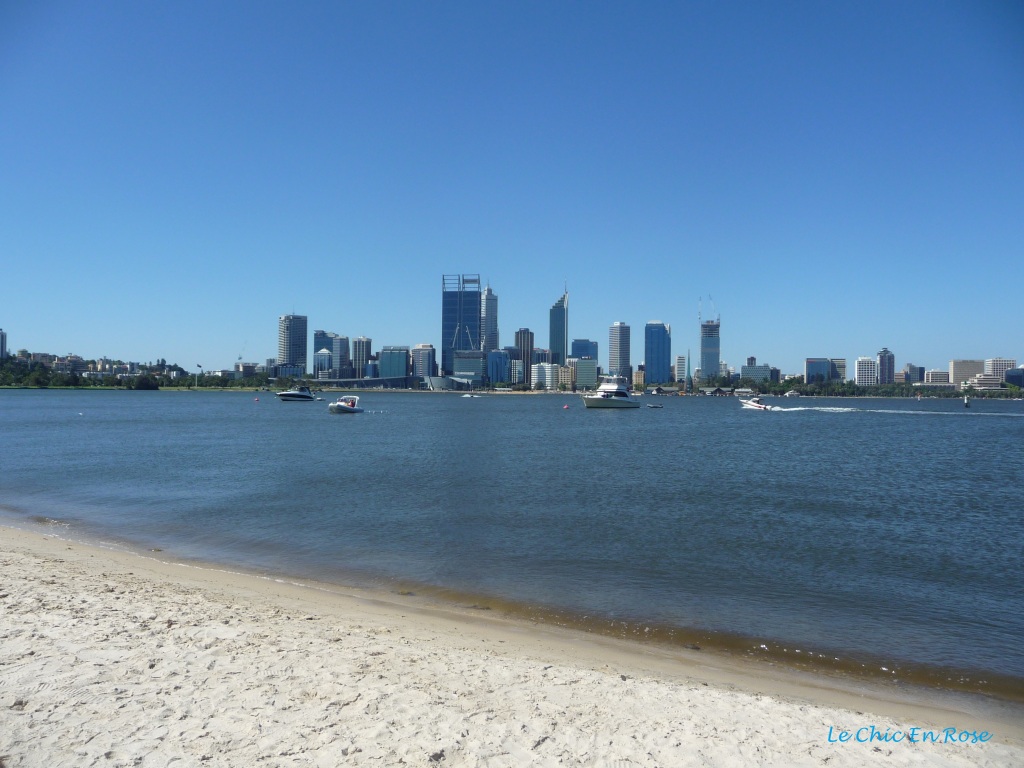 View back towards Perth city centre from the South Perth foreshore. The Swan River is in the foreground.